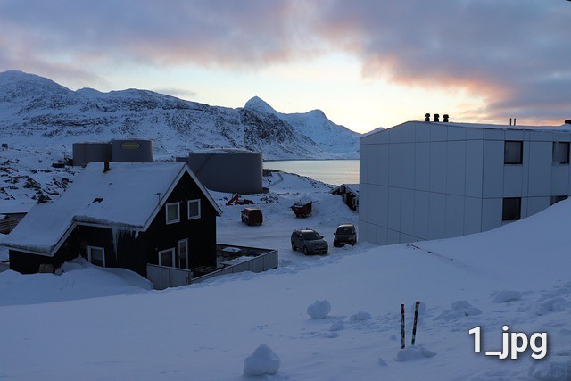 Nuuk cityscape under northern lights